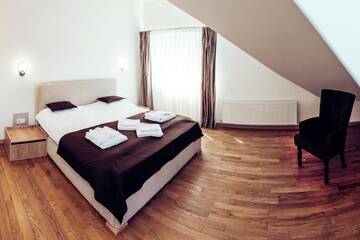 Фото номера Улучшенный четырехместный номер Отель Verhovel Hotel г. Верховина 8